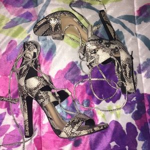 Lace Up Snakeskin Pumps